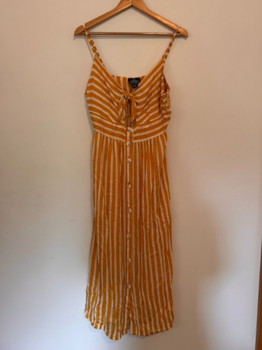 Yellow and white stripped dress with buttons and twist front